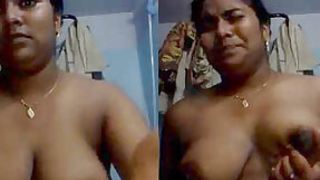 Tamil teen squeezing her tits with hot expression