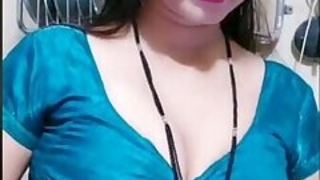 Pretty and Sexy Bhabhi Shows Her Neckline and Takes Her Blouse Off