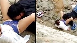 Young guy sniffs his panties and licks his girlfriend Desi's pussy outdoors and caught on camera
