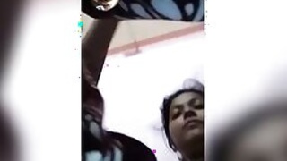 Desi Indian girl with big tits on a video call with her lover