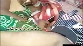 Bhabha's pussy drilled by her husband with a candle on a video call with a clear conversation in Hindi