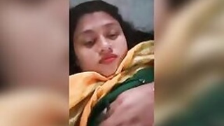 Silly desi XXX chick shows her big tits to her boyfriend