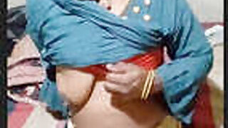 Pervy hubby shoots video of his wife showing her breasts